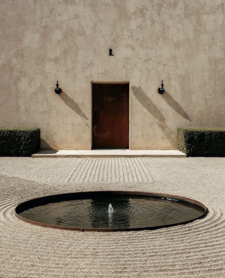 Minimalist water feature in a tranquil courtyard
